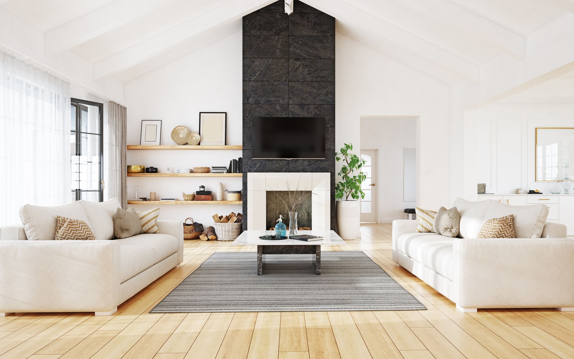 A living room with hardwood floors and stairs in a house.