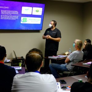 Full Arch Masters students discussing technology