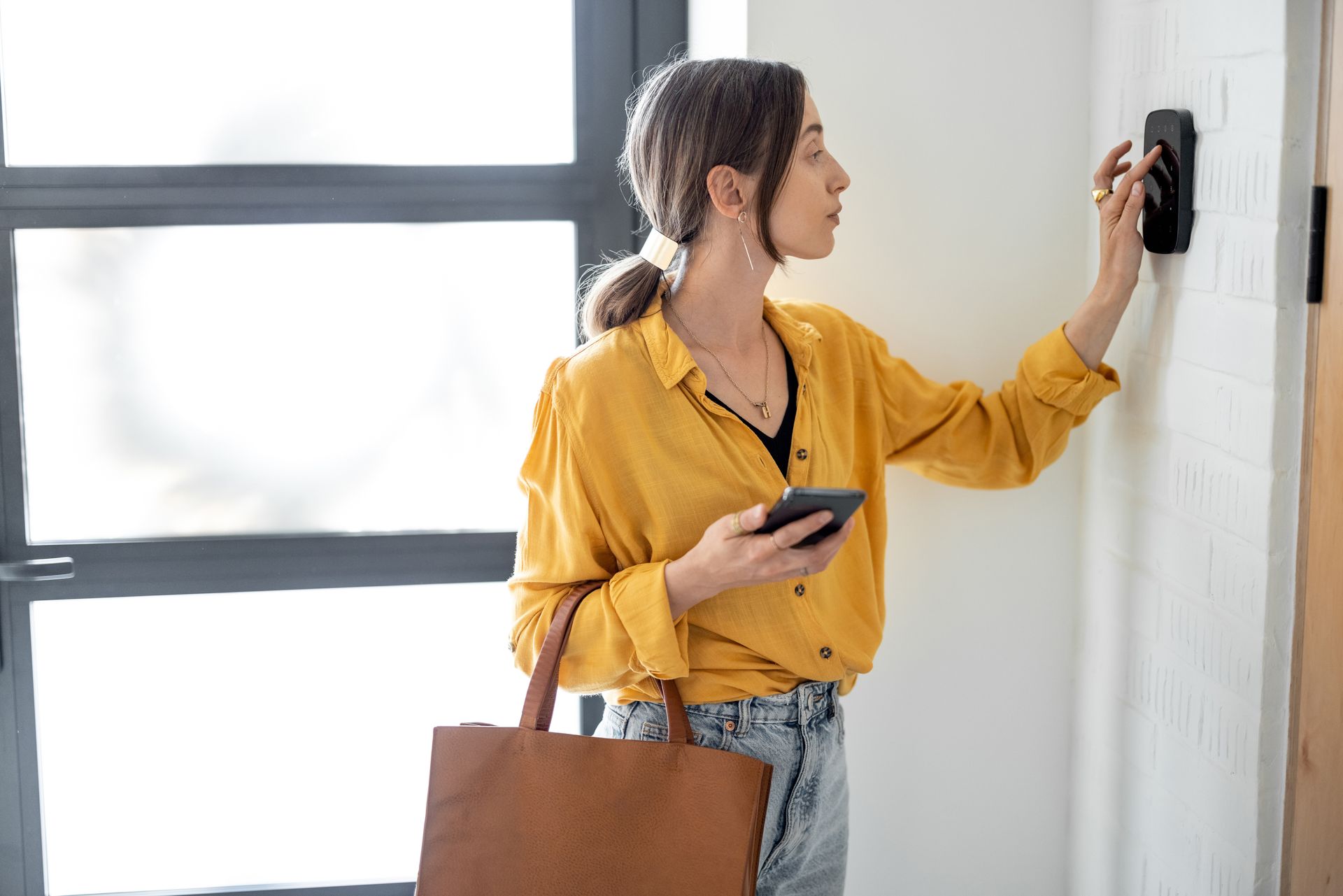 A woman is entering a code. A woman is entering a code.