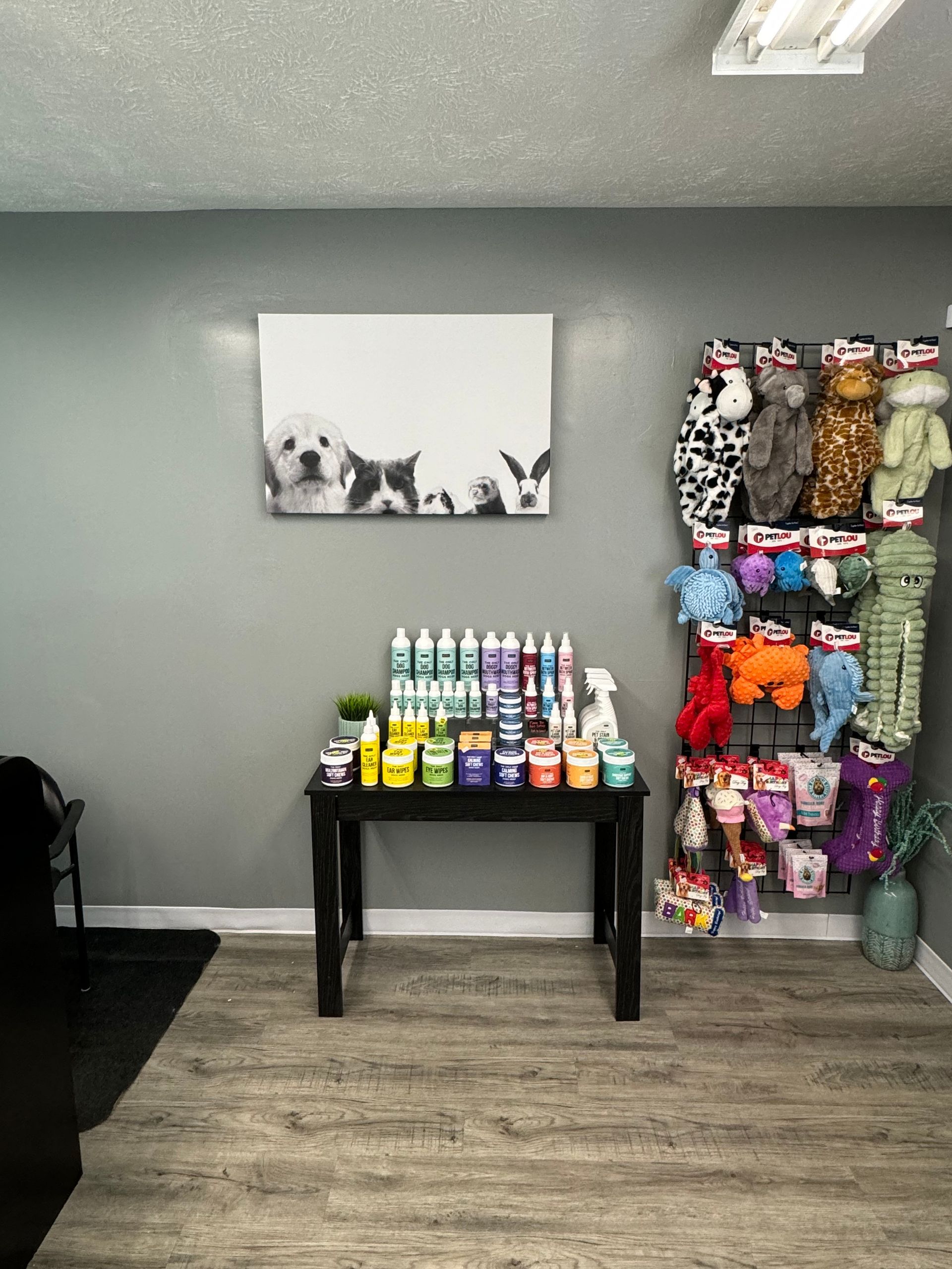 A room with a table and a bunch of toys on it.