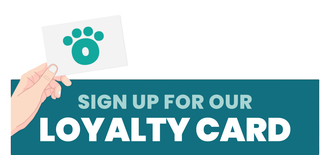A person is holding a sign that says `` sign up for our loyalty card ''.