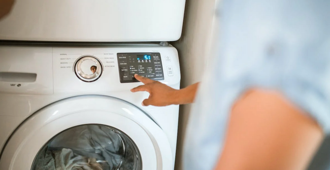 Self-service laundry machines at Laundry Loop in Cypress, Texas with modern washers and dryers