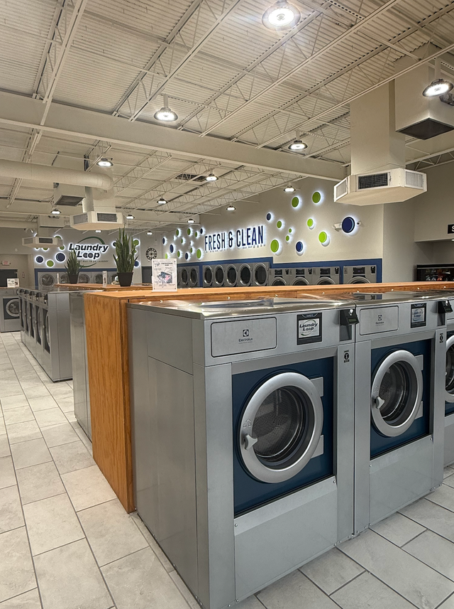 Clean and spacious self-service laundromat at Laundry Loop, Cypress TX