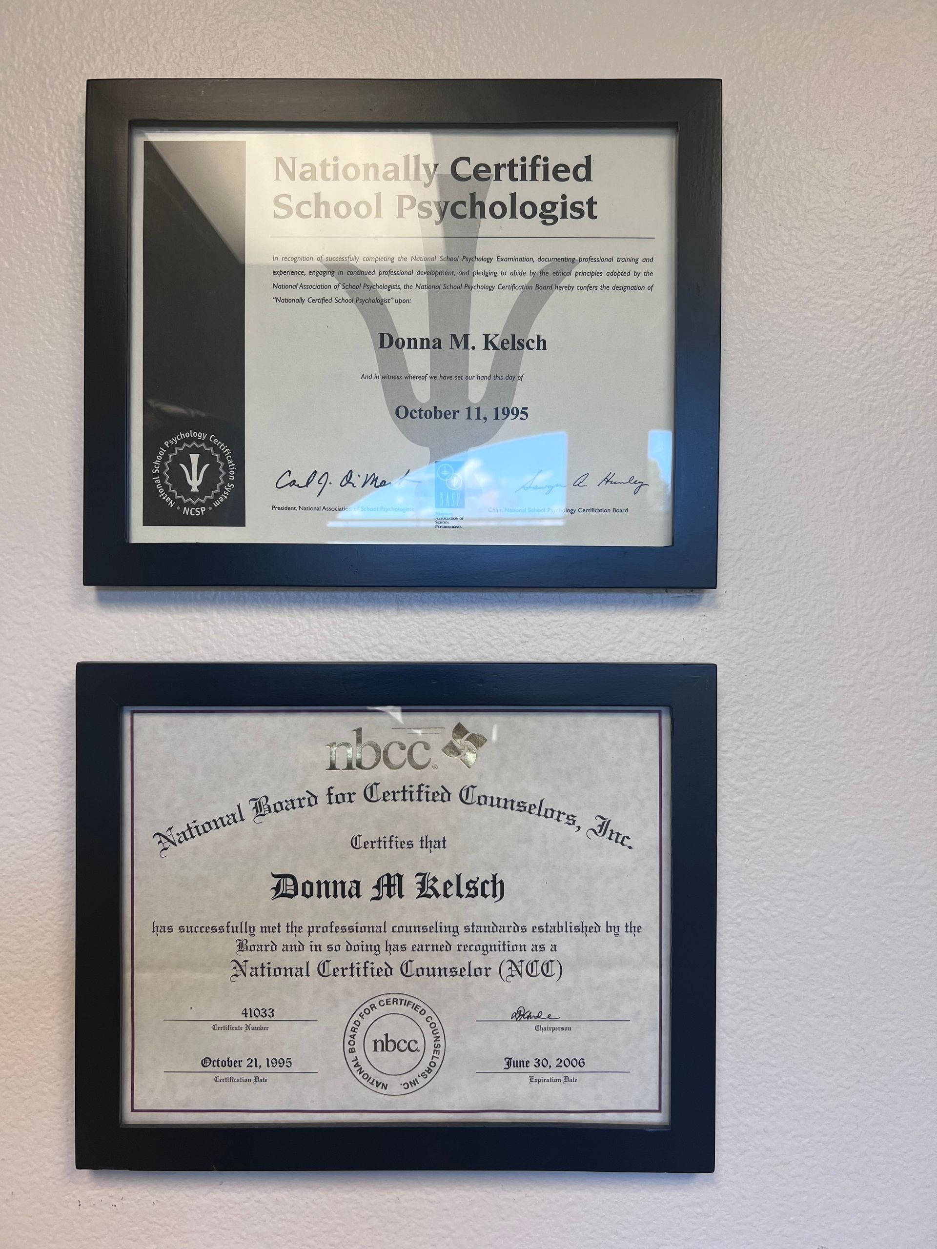 Two framed certificates one from the nationally certified school psychologist
