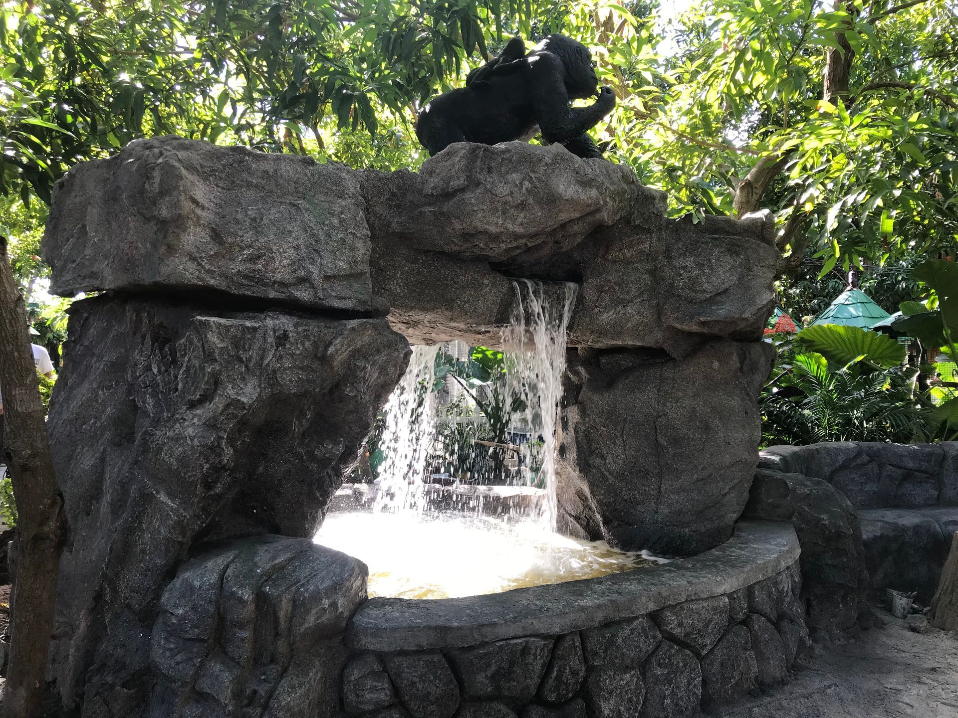 Custom artificial rock and natural stone waterfalls compared for Kansas City backyard design and ins