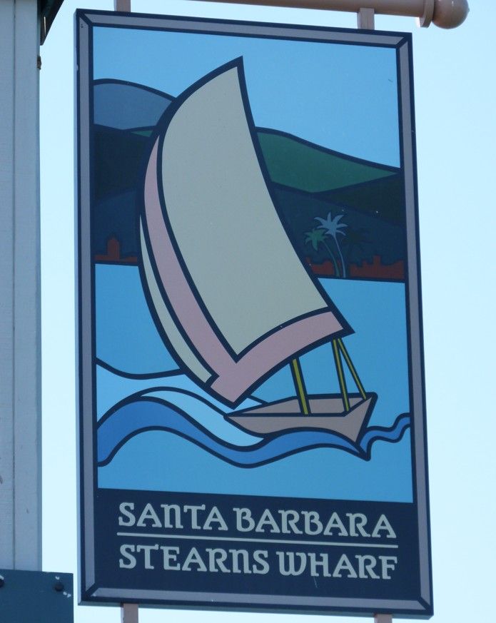 Bord voor Stearns Wharf in Santa Barbara met een afbeelding van een zeilboot.