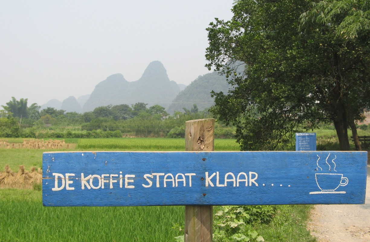 Blue sign with Dutch text 