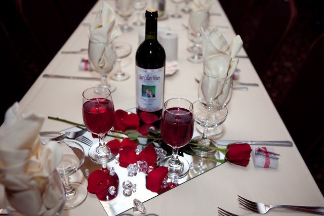 A bride and groom toasting with champagne at their wedding reception