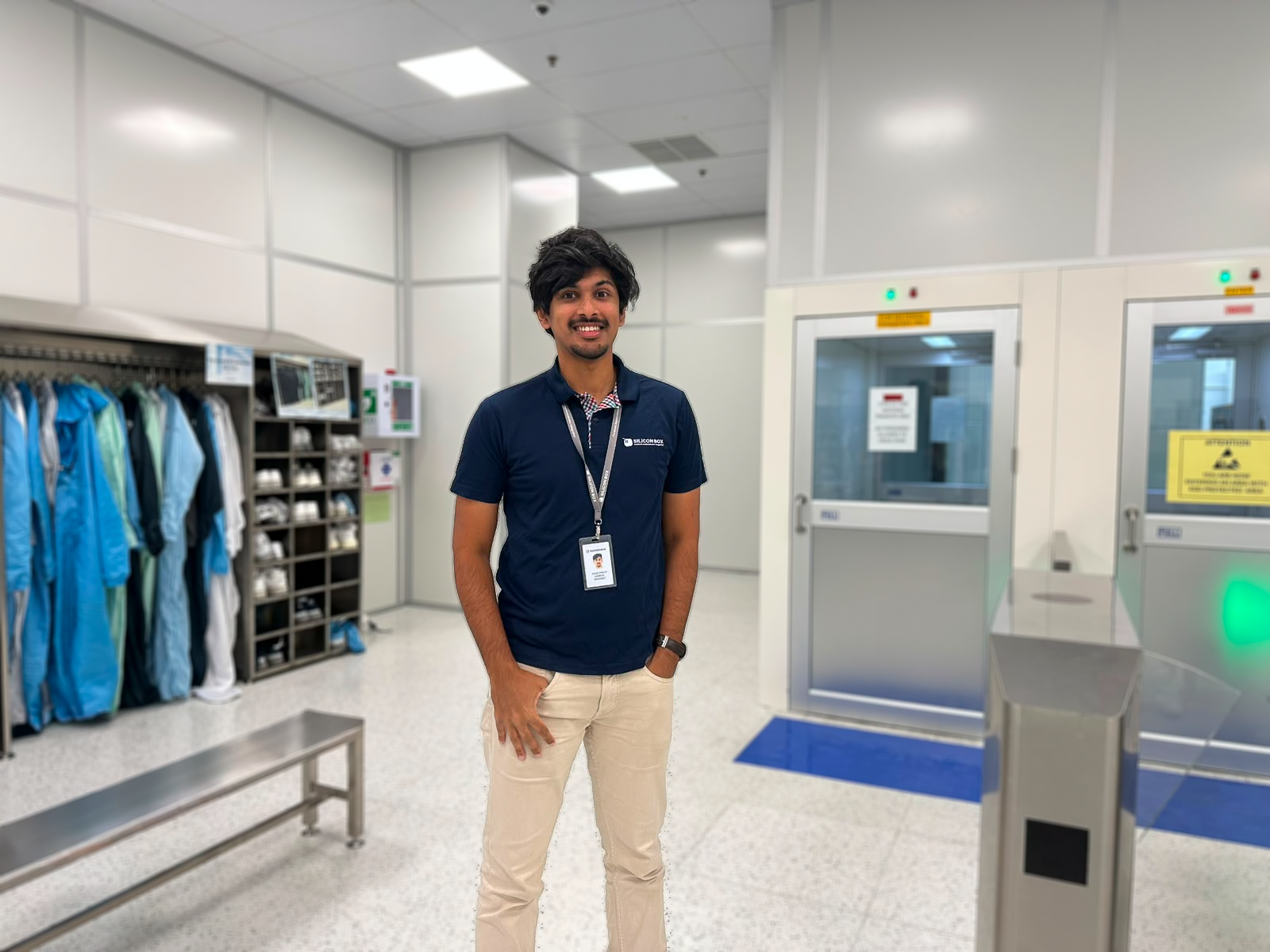 Silicon Box Engineer standing in gowning room