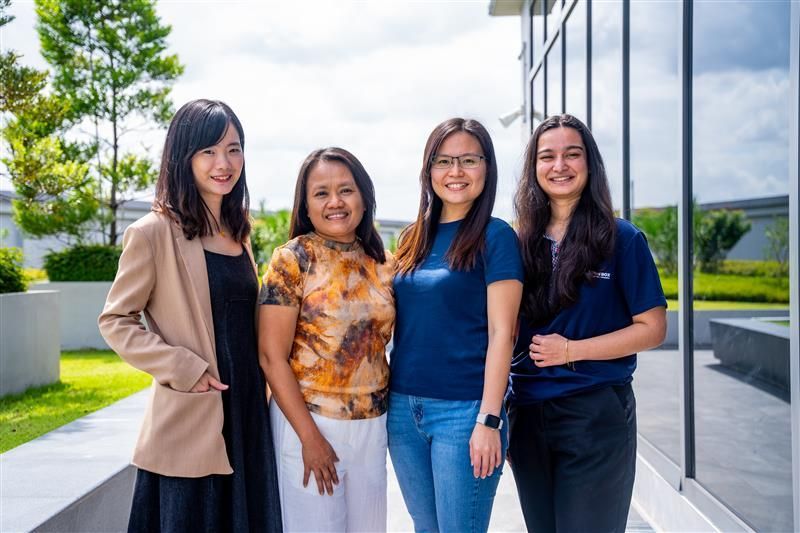 Four female engineers standing together for a photo