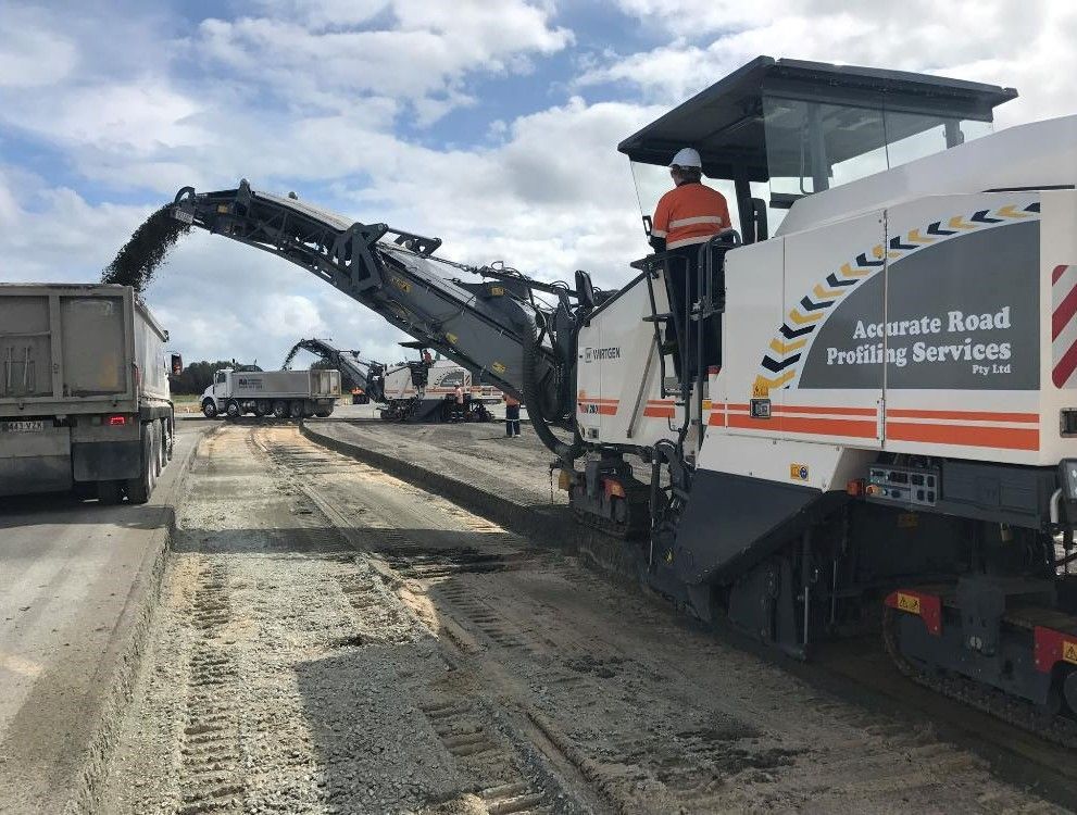 Two Wirtgen Machine Removing Asphalt On The Road — Road Profiling in Caboolture, QLD