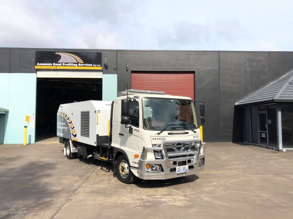Road Dryer Truck Outside The Garage — Road Profiling in Caboolture, QLD