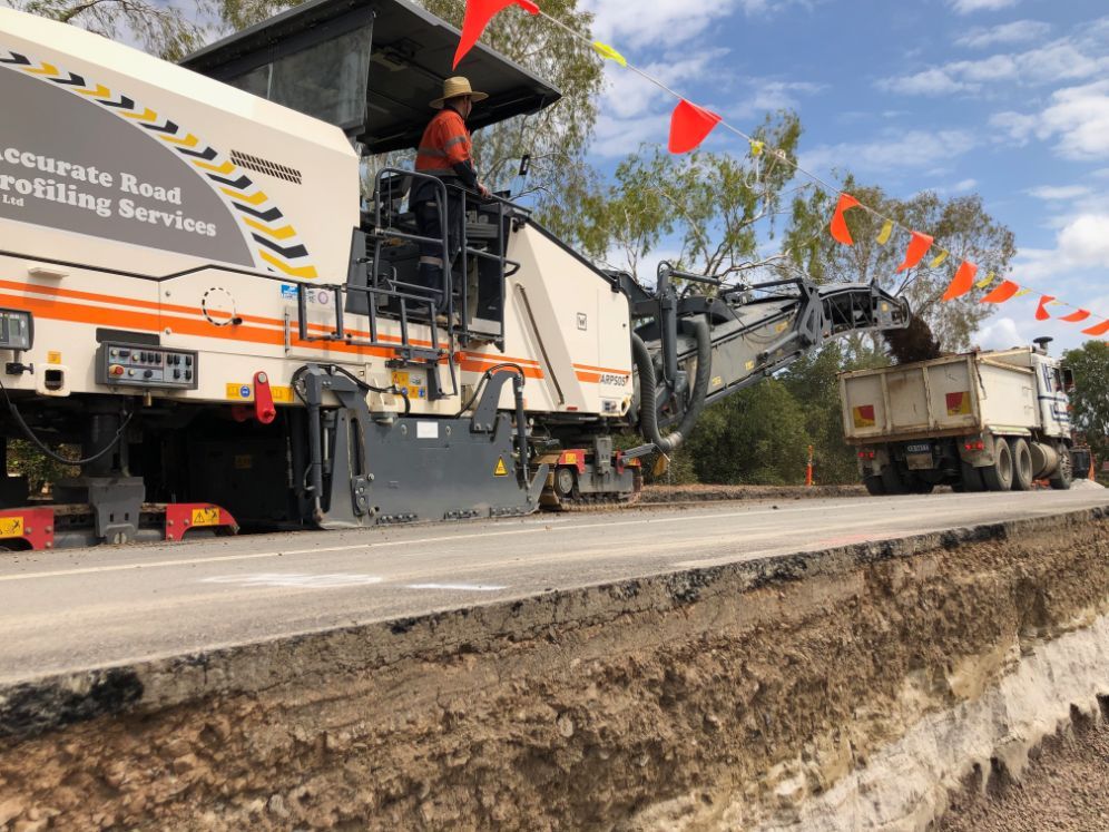 Man On A Wirtgen Machine Working On The Road — Road Profiling in Caboolture, QLD