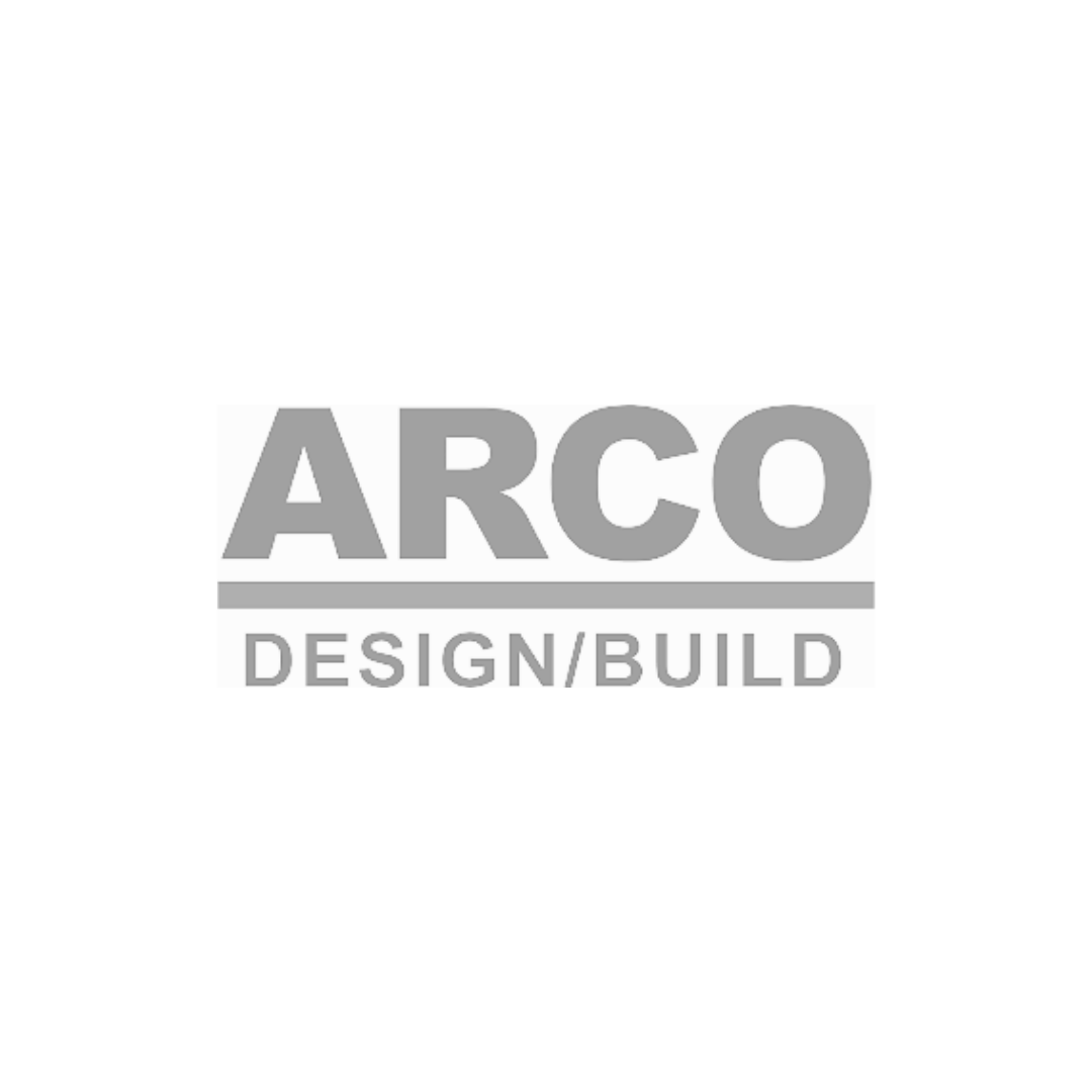 The logo for arco design / build is a gray logo on a white background.