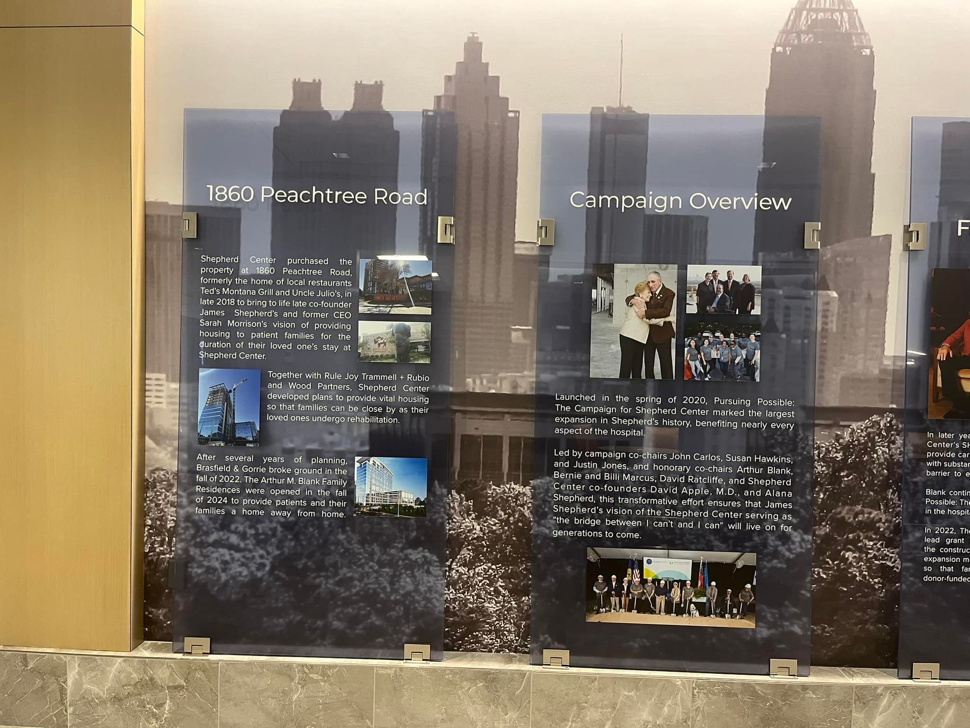 Timeline display with text and photos against a city skyline backdrop.