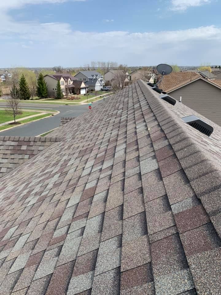 The roof of a house with a lot of shingles on it.