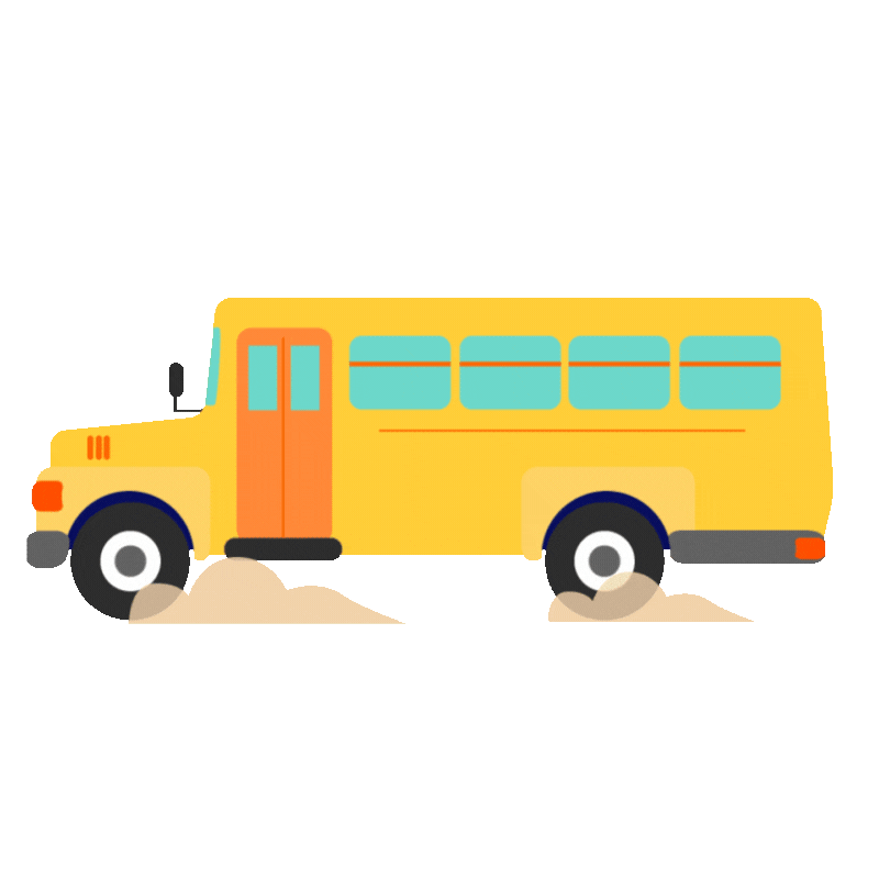 Yellow school bus driving in sand.