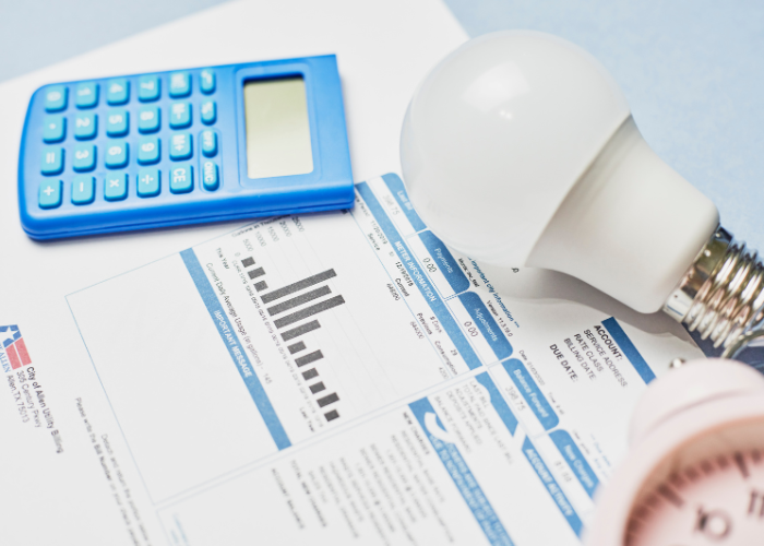 Image of water bill with light bulb and calculator