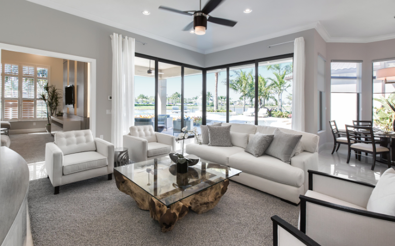 Photo of living room looking out toward backyard