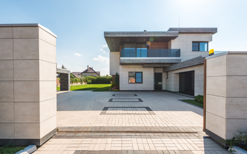 Photo of house from driveway/entry gate