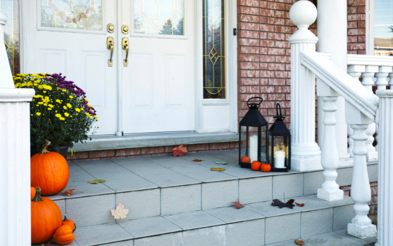 front porch with fall decorations