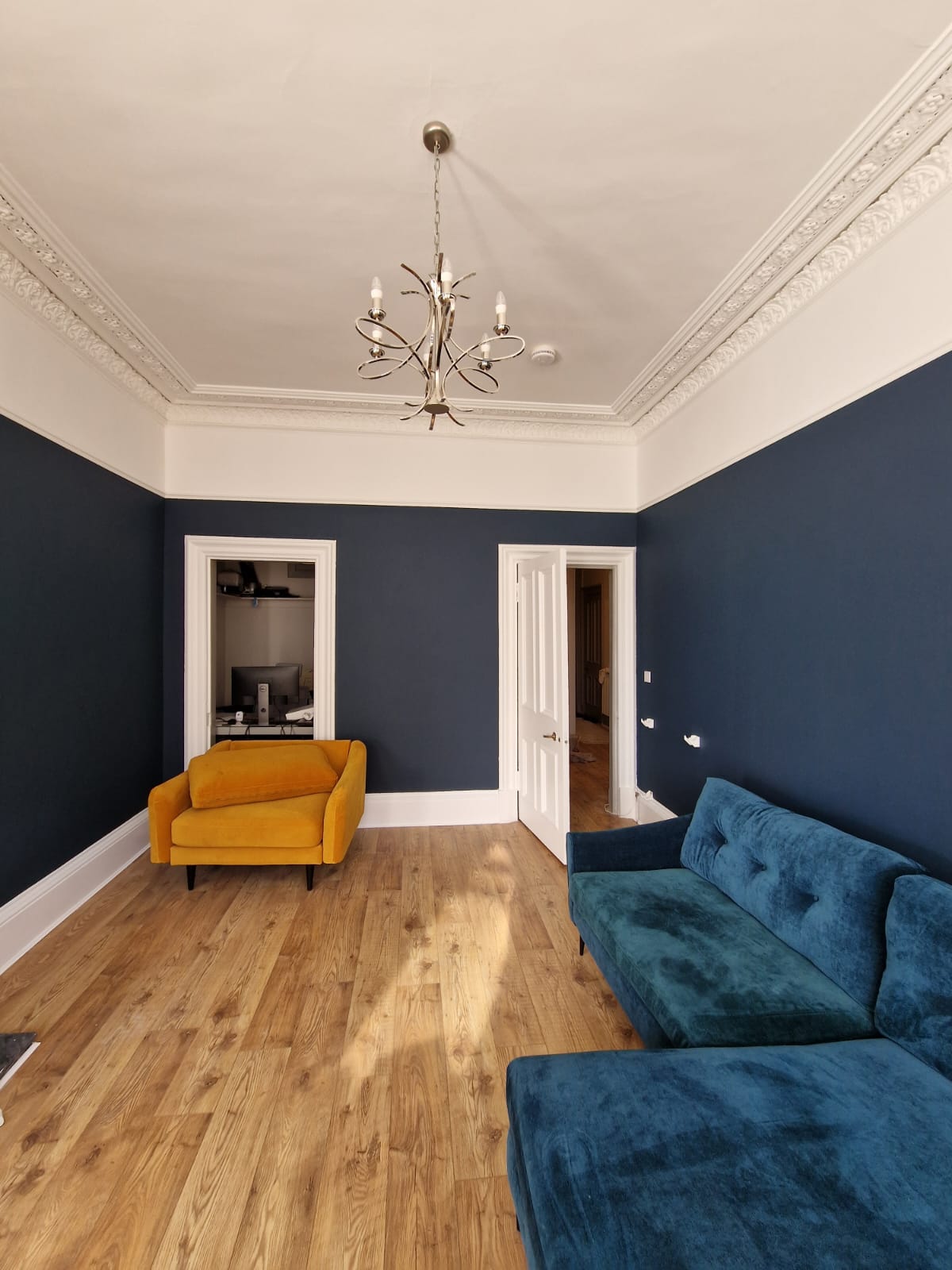Living room painted blue and white by Painters and Decorators Edinburgh