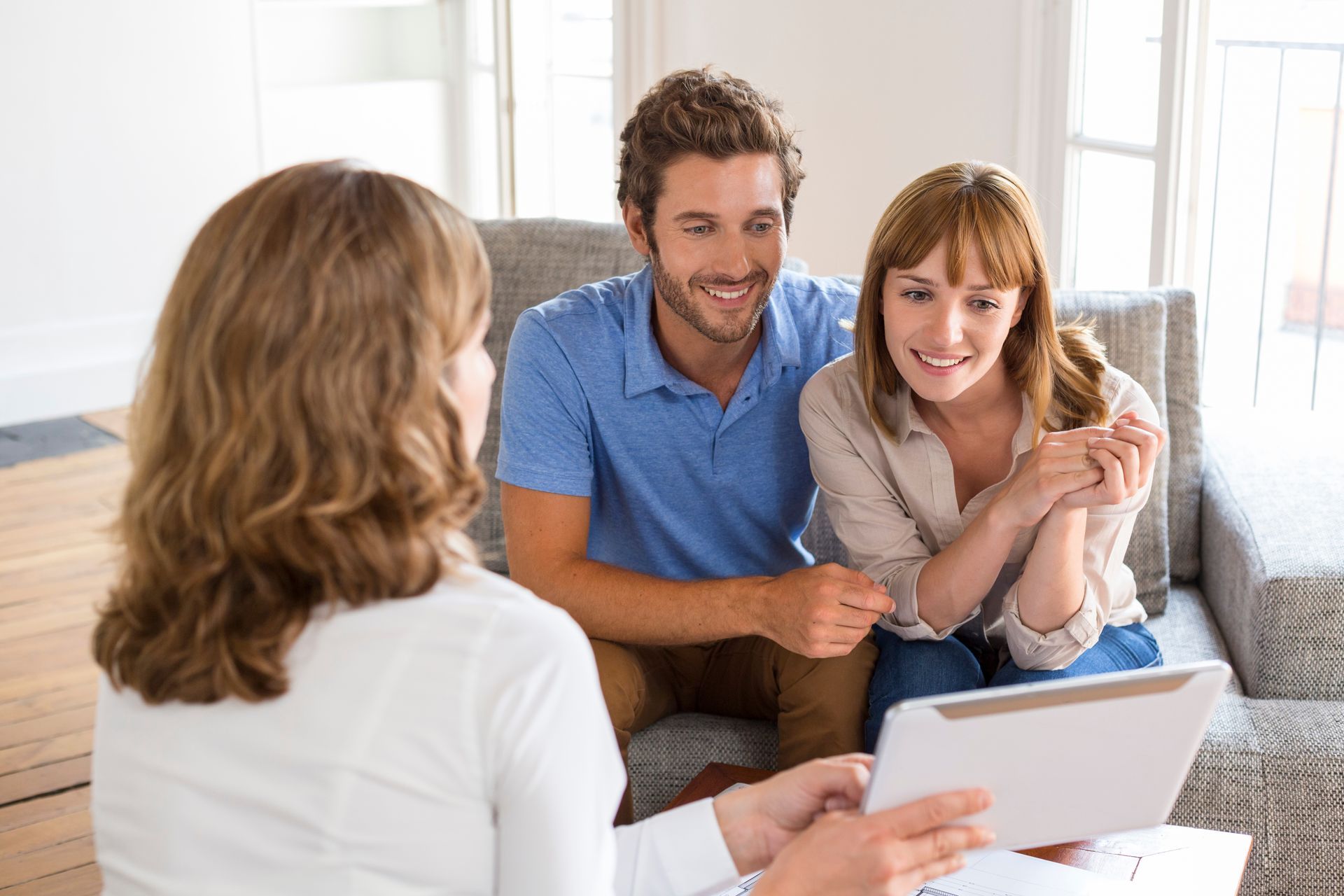 Smiling Me & Him Removals & Storage customer discussing removals and storage with an agent.