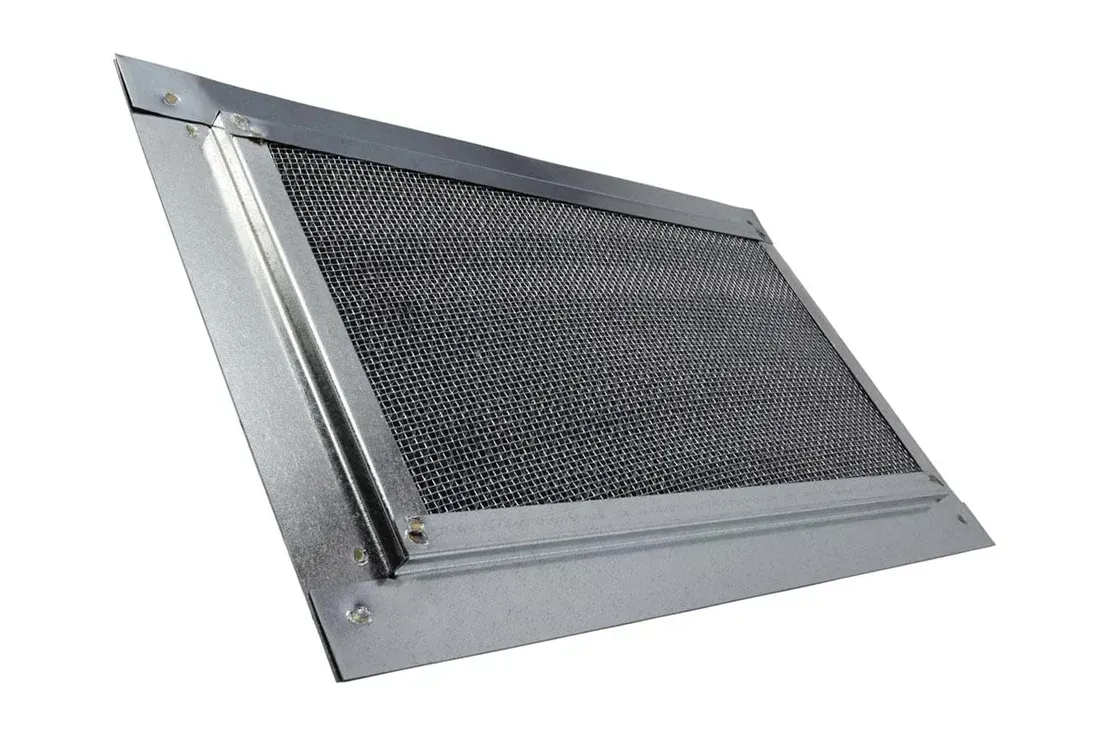 Metal mesh ventilation grate with a silver frame, viewed at an angle.