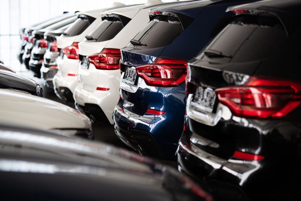 A Row Of Cars Are Parked In A Showroom โ Tonics Automotive in Garbutt, QLD