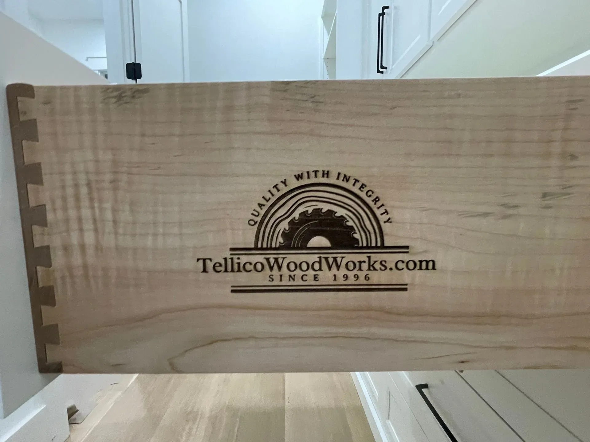 Wooden board with TellicoWoodWorks.com logo burned into the center.