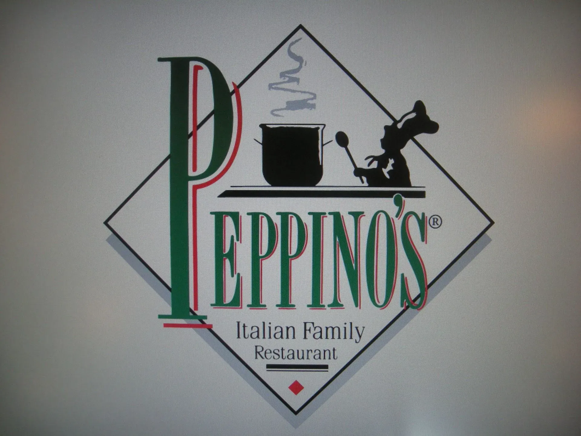 Peppino’s Italian Family Restaurant logo with a chef hat, pot, and black cat silhouette on a diamond sign