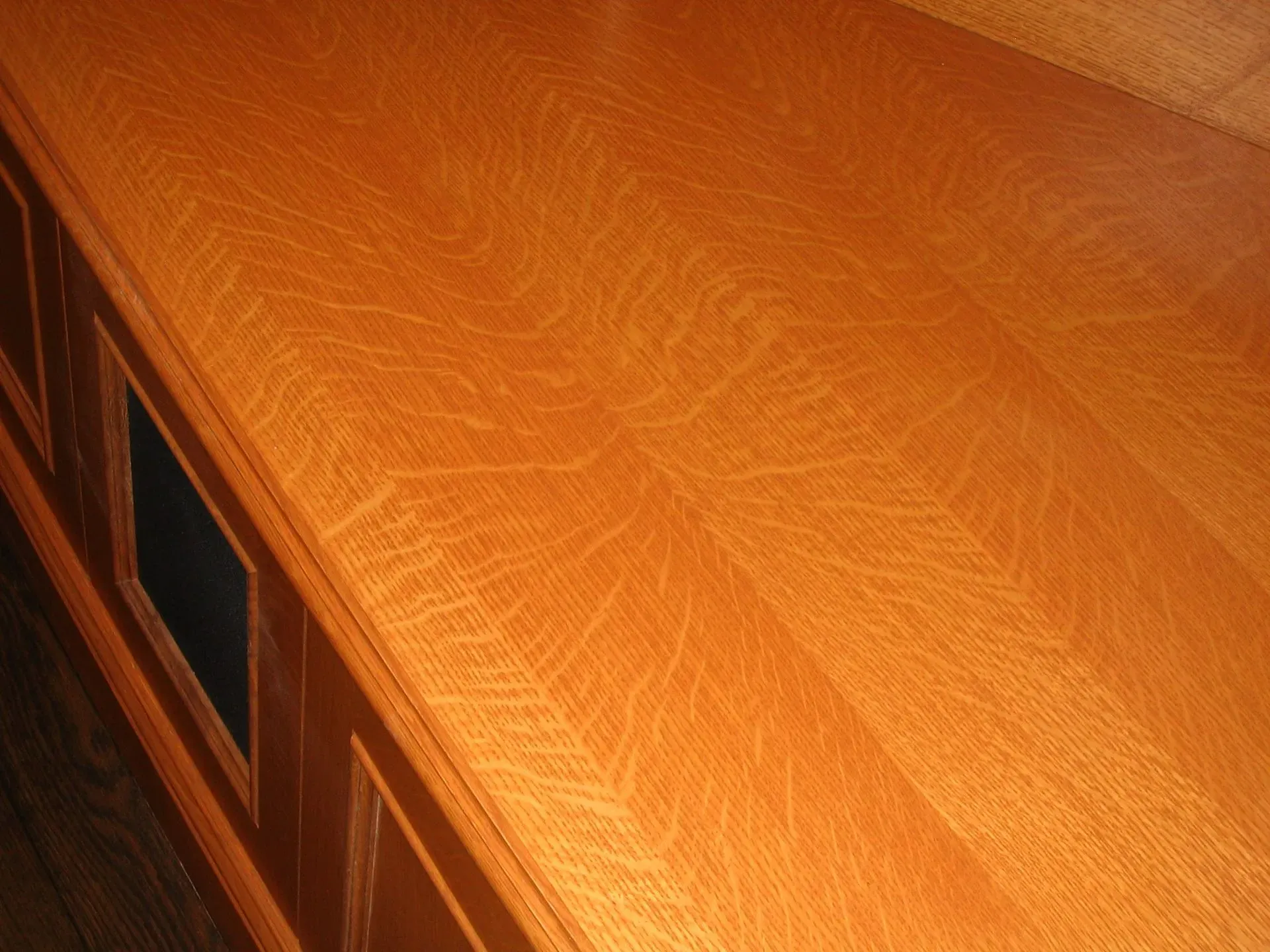 Orange textured wooden tabletop seen at an angle