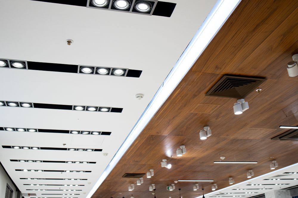 Dealership showroom ceiling with a lot of lights on it