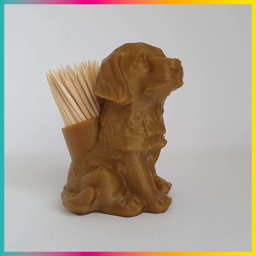 Hond als houder van cocktailprikkers 