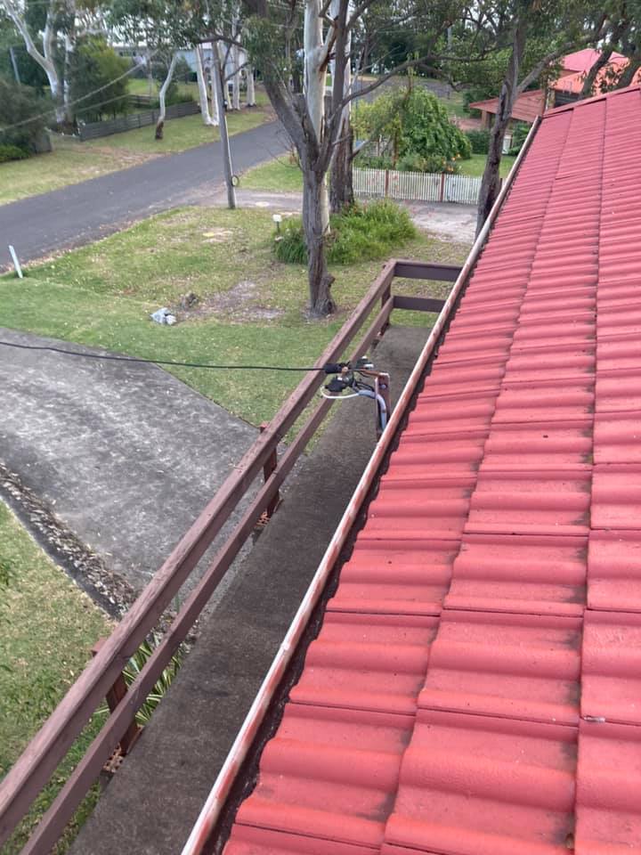Red Roof With Clean Gutter — Gutter Cleaning In Shoalhaven, NSW
