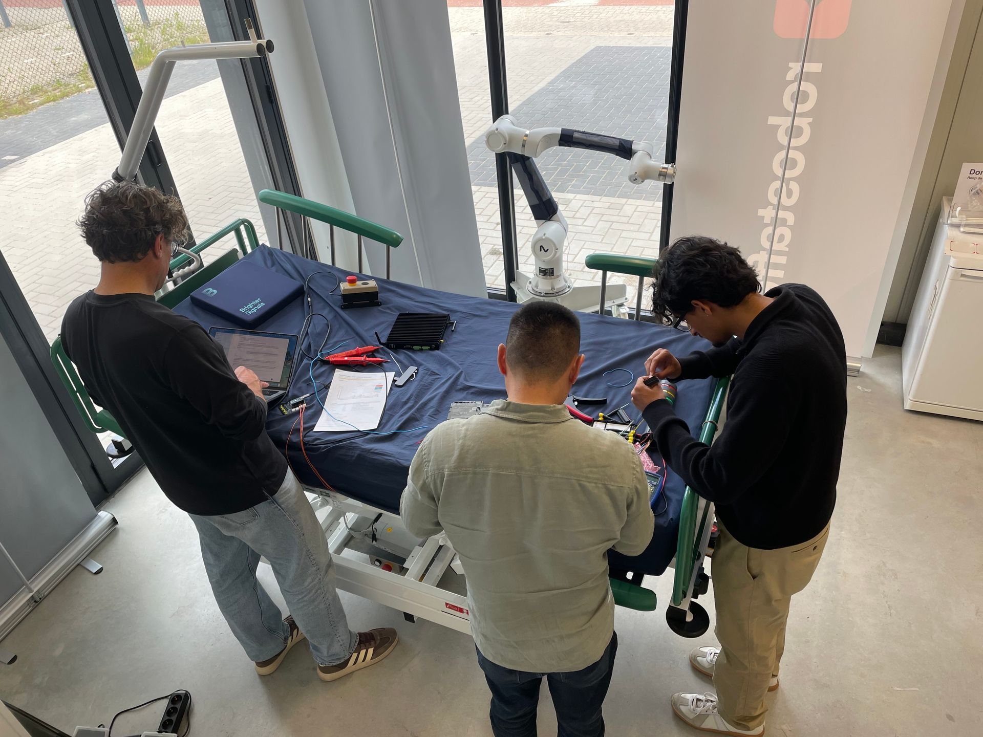 Team working on robot bed
