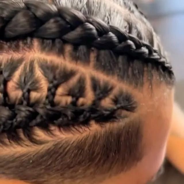 Close-up of braided cornrows with a star-like braided pattern on the scalp