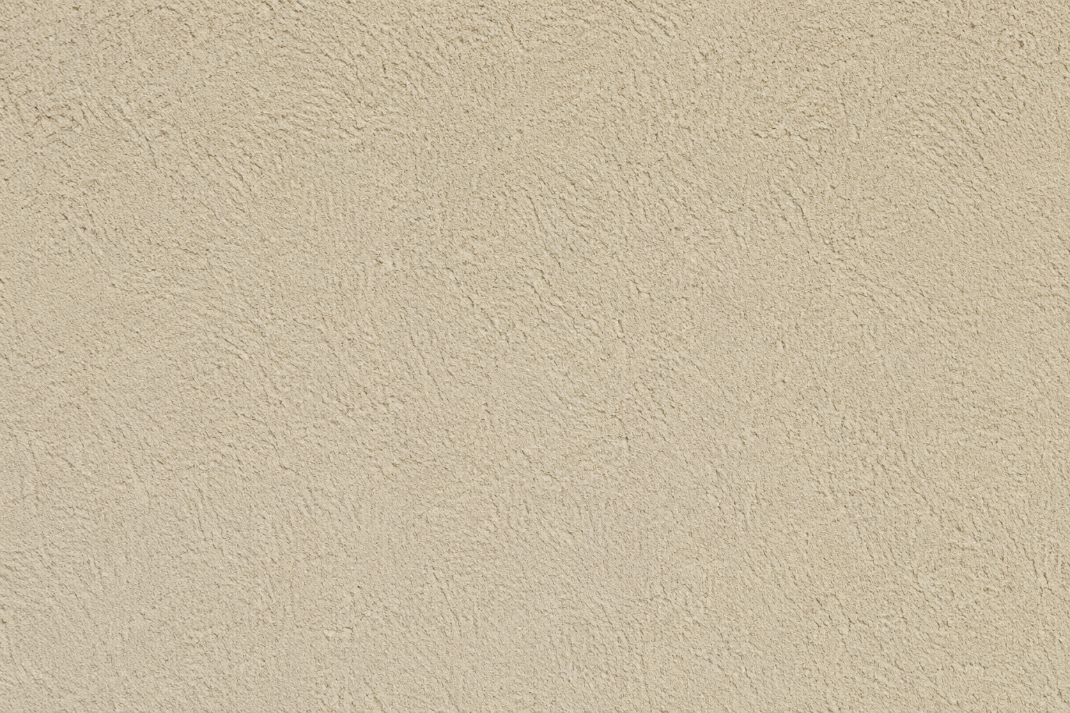Beige textured wall or ceiling surface with speckled finish