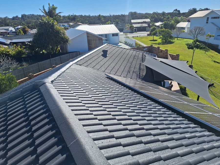 An Aerial View of a Roof of a House in a Residential Area — Roofing Gold Coast in Tallebudgera, QLD
