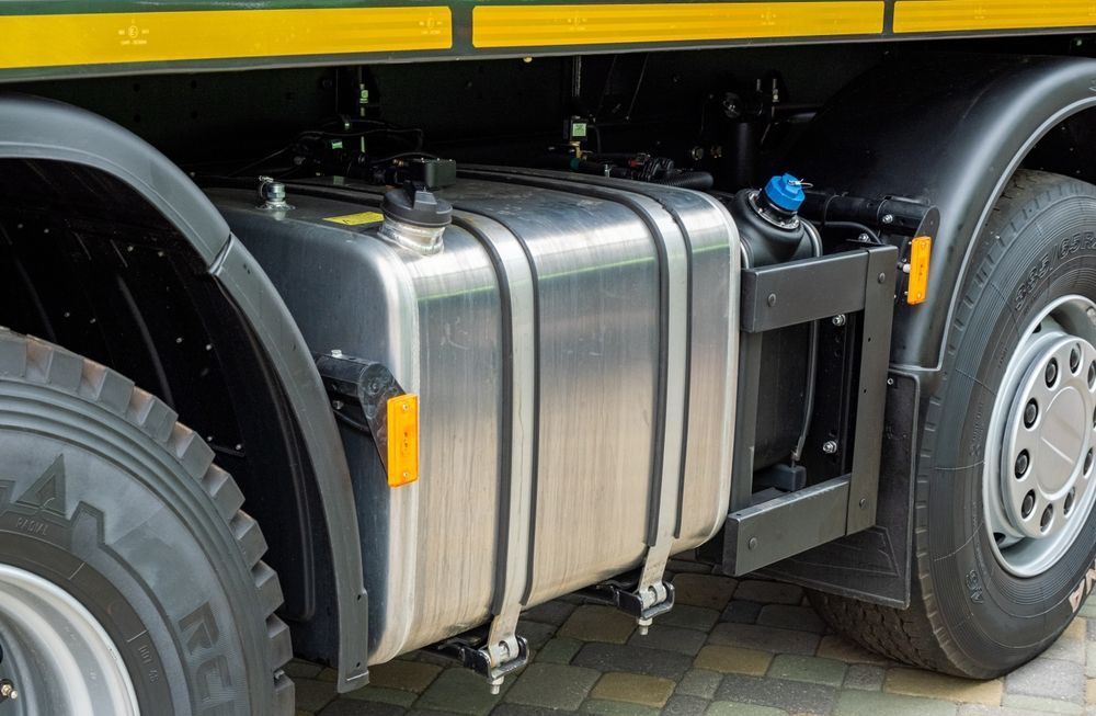 Fuel Tank on a Large Truck Silver Metal With Black Supports — COD Automotive in Ashmont, NSW
