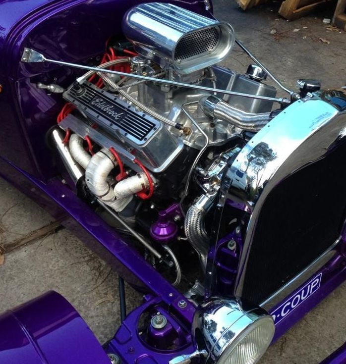 A Close Up of a Purple Car With the Engine Exposed — South Coast Radiators In Woonona, NSW