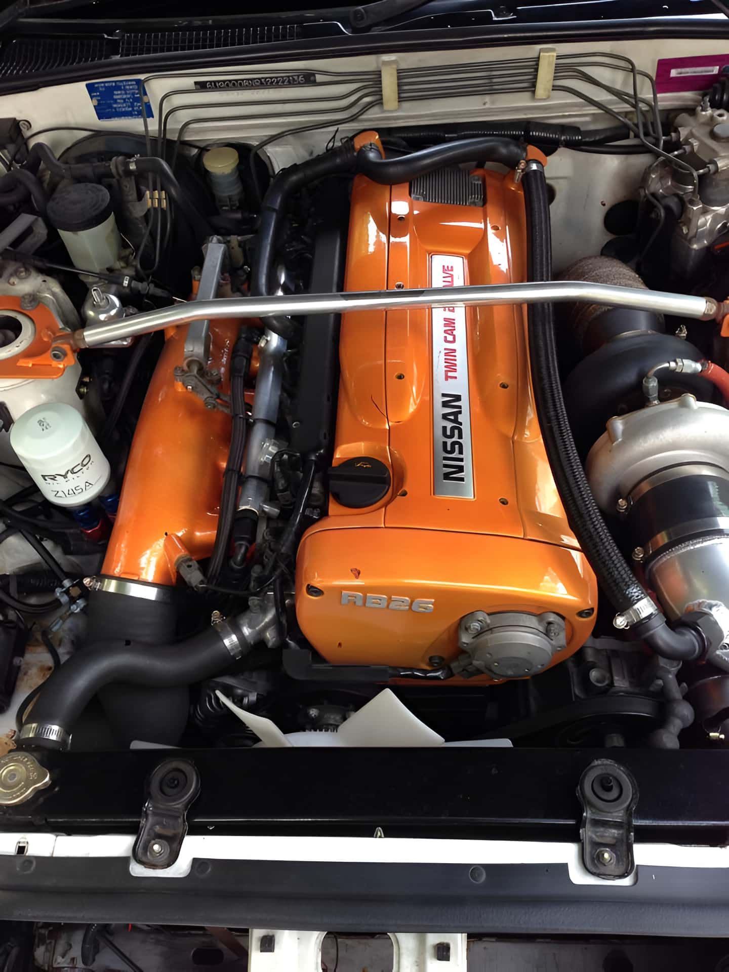 A Close Up of a Nissan Engine in a Car — South Coast Radiators In Woonona, NSW