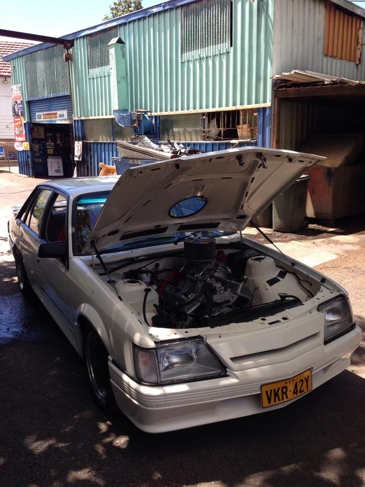 A White Car With the Hood — South Coast Radiators In Blacktown, NSW