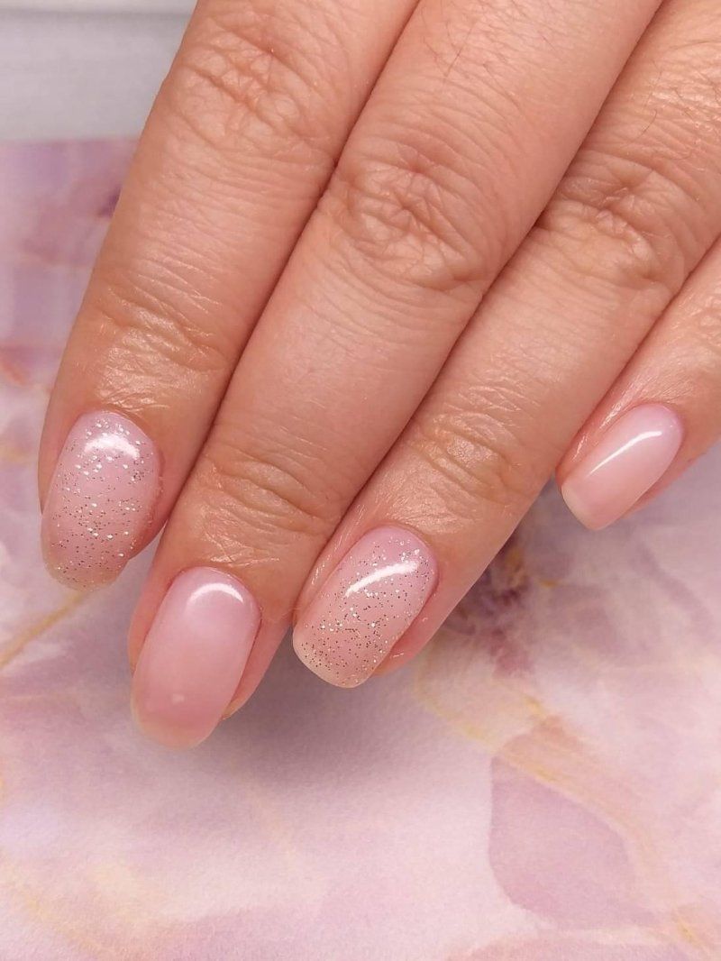 Signature manicure with classic nude polish finish at Perfect You Spa