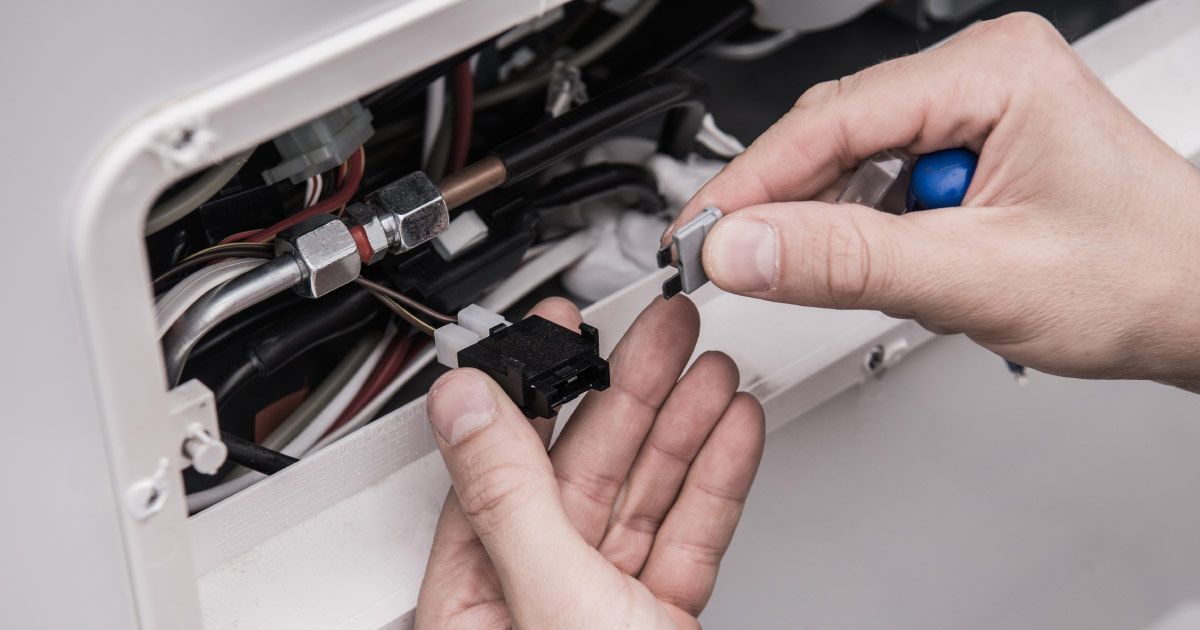 an rv electrical box being worked on