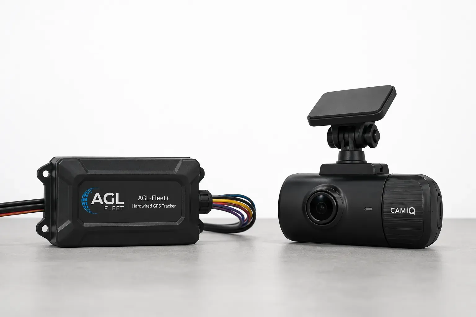 Hardwired GPS tracker and fleet camera showing different fleet technology options.