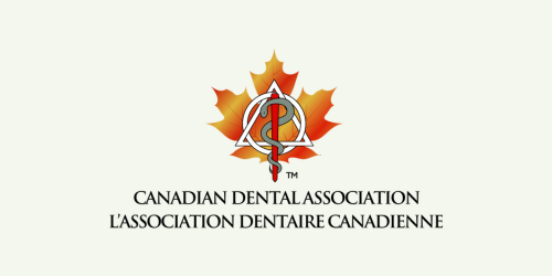 The logo for the canadian dental association has a maple leaf and a caduceus.