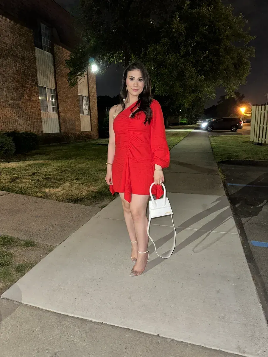 Original outfit photo with a red dress, white handbag, and heels.