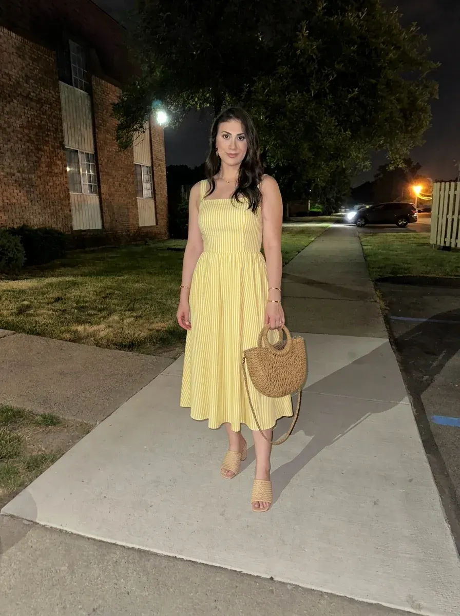 AI-generated preview showing the yellow outfit on the same person.