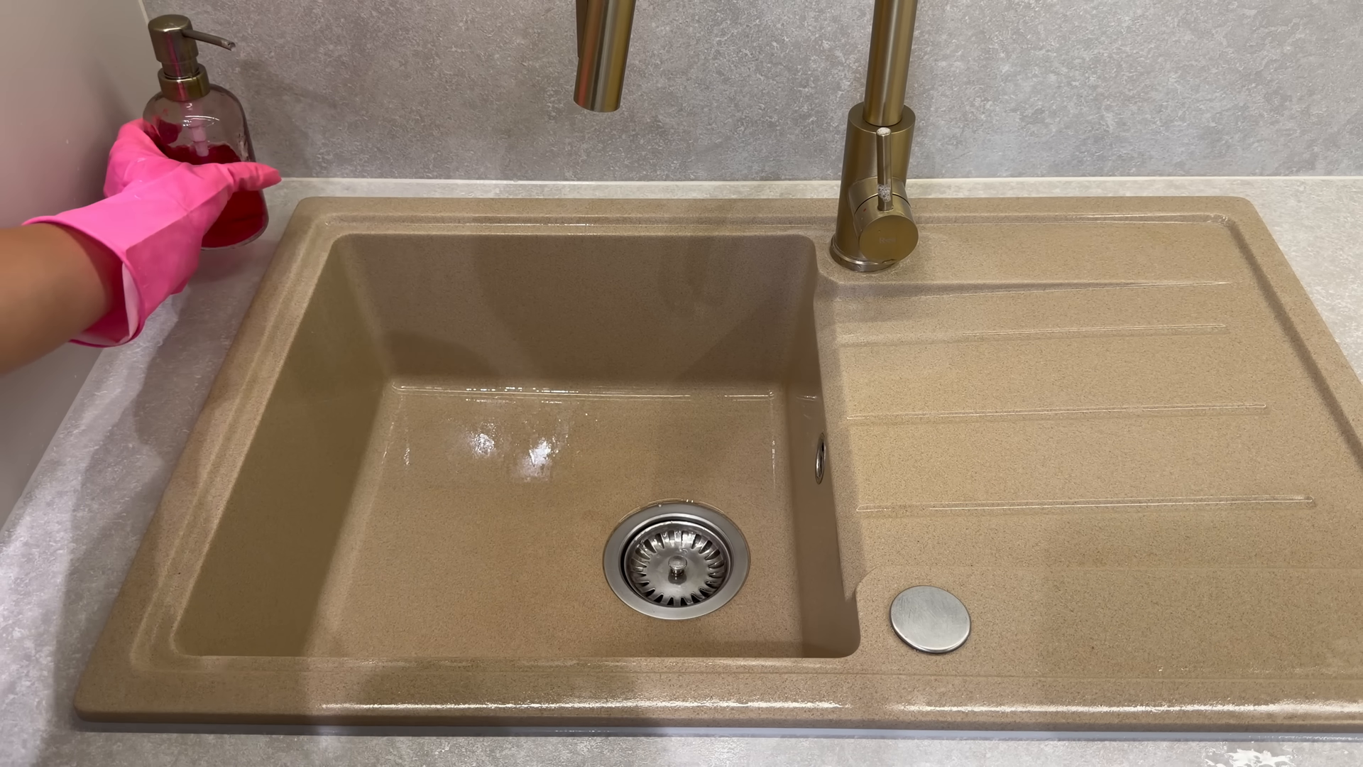 Cleaner resetting a Queens rental apartment between guest stays
